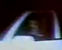 Primo fotogramma del volto del guidatore della ghost car